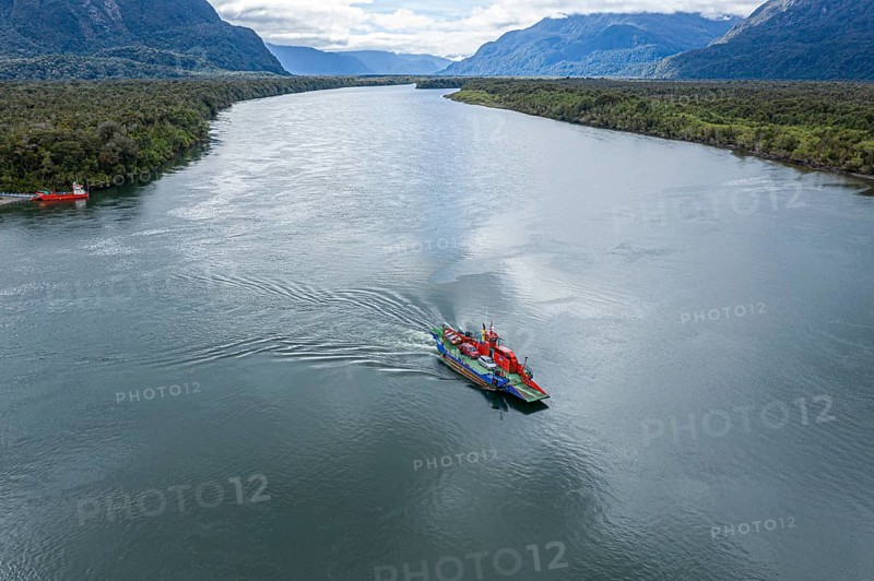 Aerial view of ferry crossing the river Rio Palena, connecting the road to Puerto Raul Marin Balmaceda, Patagonia, Chile, South America