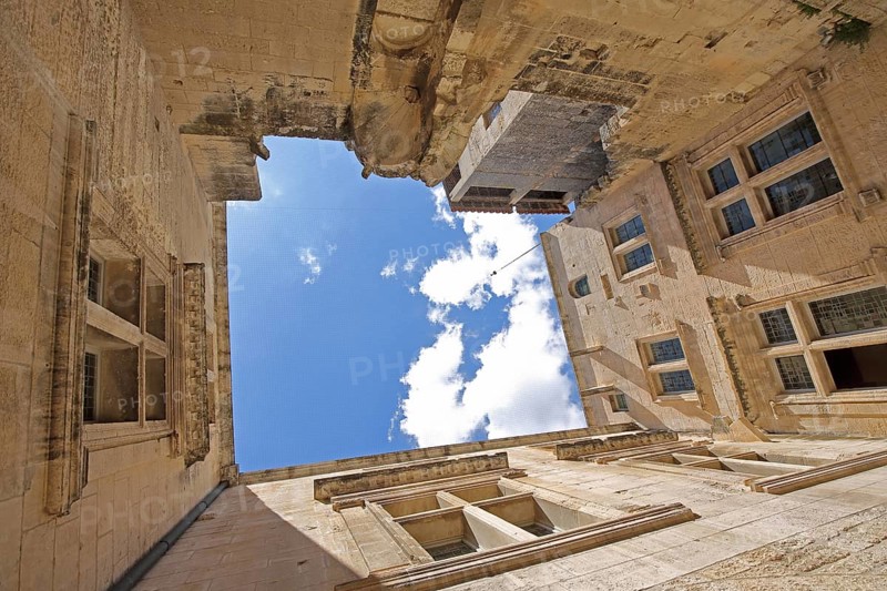 Houses and courtyard with view upwards, Mairie town hall, mountain village, Les Baux-de-Provence, Alpilles, Alpilles, Bouches-du-Rhône, Provence, France, Europe