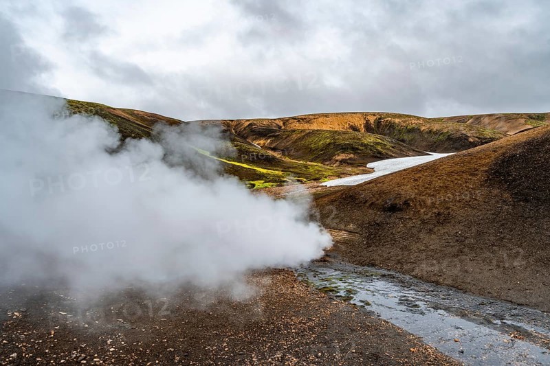 Colourful volcanic landscape with hills and snow, volcanic steaming hot springs, Laugavegur trekking trail, Landmannalaugar, Fjallabak Nature Reserve, Icelandic Highlands, Sudurland, Iceland, Europe