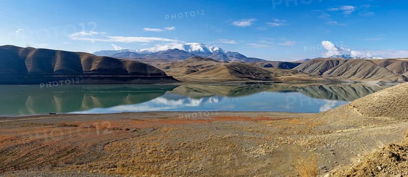 Mountains reflecting in Van Lake, Van, Turkey, Asia