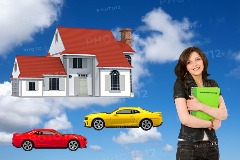 Young woman in front of detached house holding portfolio, with a life insurance policy, wishes, dreams, car, house, pension plan