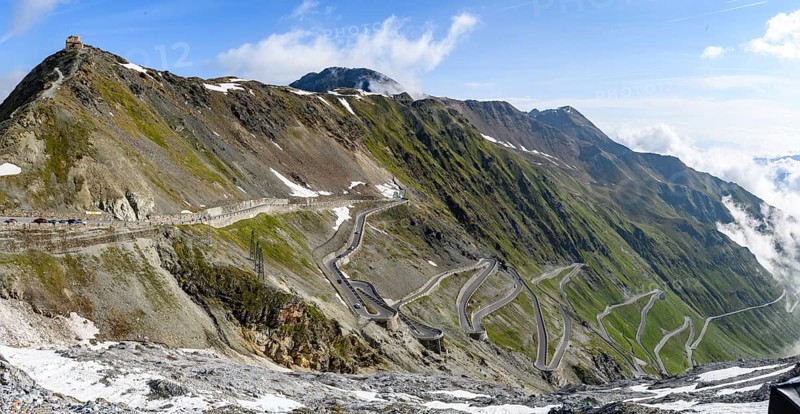 Panoramic view of east ramp north ramp Ascent from to 2757 2758 metres high pass road Mountain pass Alpine pass with serpentines tight bends Stelvio Pass Stelvio, Stilfs, top left on mountain ridge small hotel accommodation Rifugio Garibaldi, South Tyrol, Alto Adige, Italy, Europe