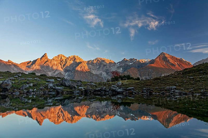 Mountains reflected in a small lake at sunset, autumn, Guggersee, AllgÃ¤u Alps, AllgÃ¤u, Germany, Europe