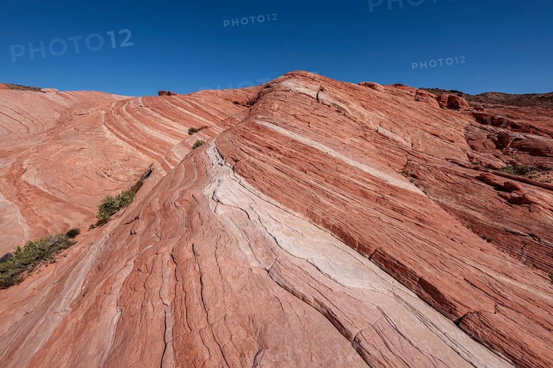Layered rock formations along the Fire Wave Trail at Valley of Fire State Park near Overton, Nevada