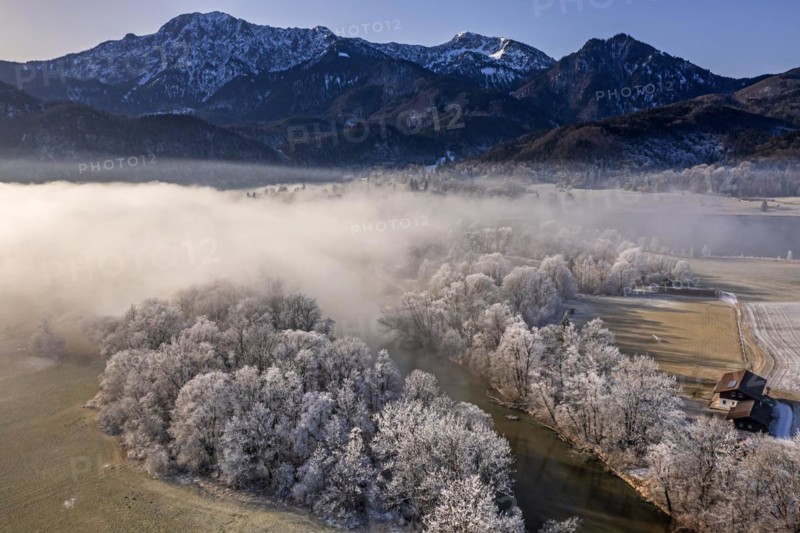 Aerial view of a river in front of mountains in winter, hoarfrost, fog, morning light, view of Herzogstand and Heimgarten, Loisach, Alpine foothills, Bavaria, Germany, Europe