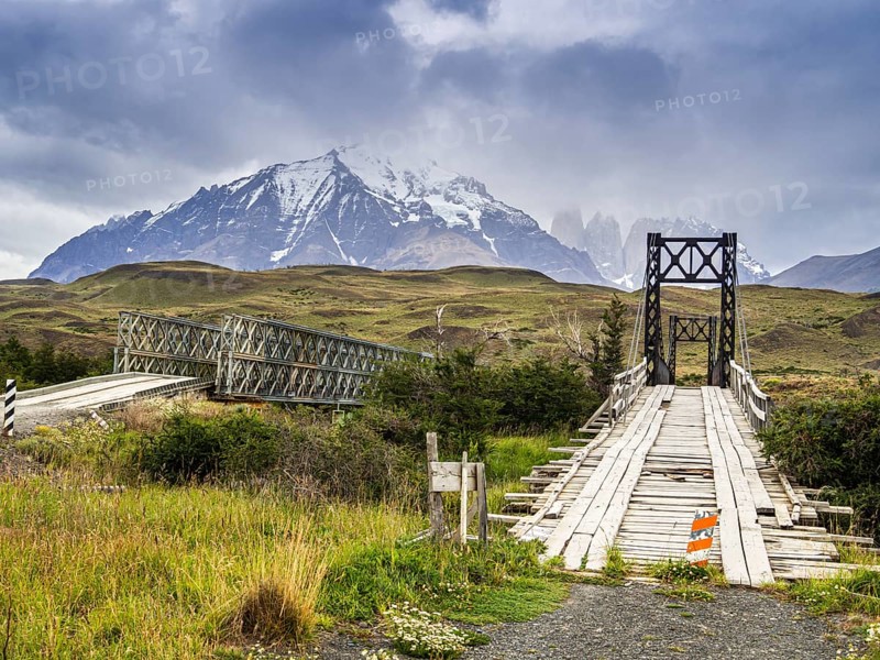 Bridge puenta laguna amarga, historic bridge, Las Torres mountains in the back, new build bridge (left), Torres del Paine National Park, Patagonia, Chile, South America