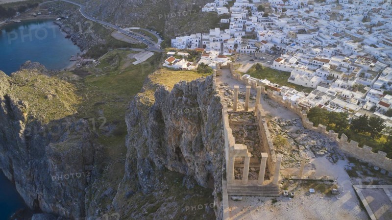 Drone shot, Acropolis of Lindos, late afternoon light, Temple of Athena Lindia, aerial view of an ancient fortress on a cliff overlooking a coastal town in the morning light, Archaeological Site, Lindos, Rhodes, Dodecanese, Greek Islands, Greece, Europe