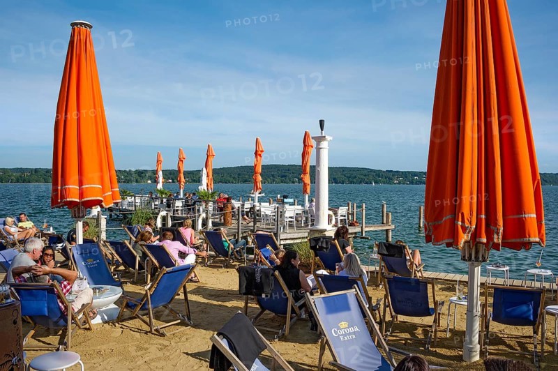 Sandy beach beach with deckchairs, lakeside restaurant, former Undosa wave pool, now H'ugo's Beach Club restaurant and bar, Hugos, lakeside promenade, Starnberg, Lake Starnberg, Upper Bavaria, Bavaria, Germany, Europe