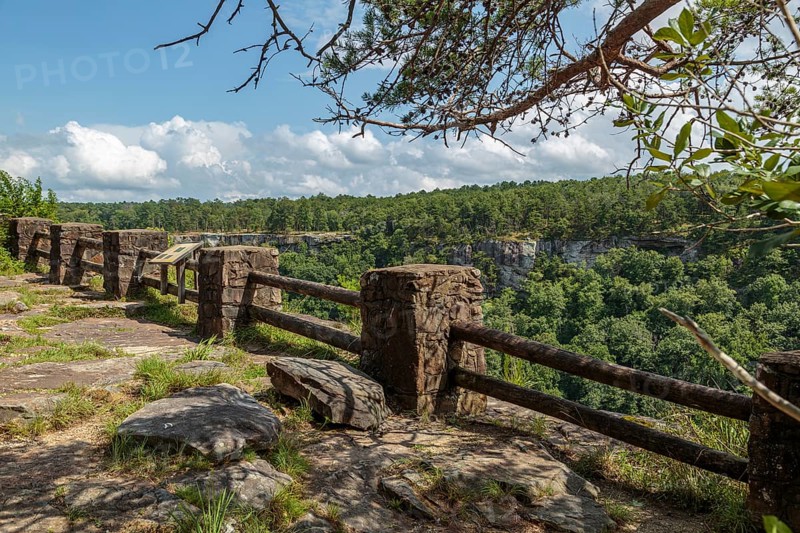 Stone and timber railing along the edge of a cliff at an overlook along the Little River Canyon Rim Parkway near Ft. Payne, Alabama