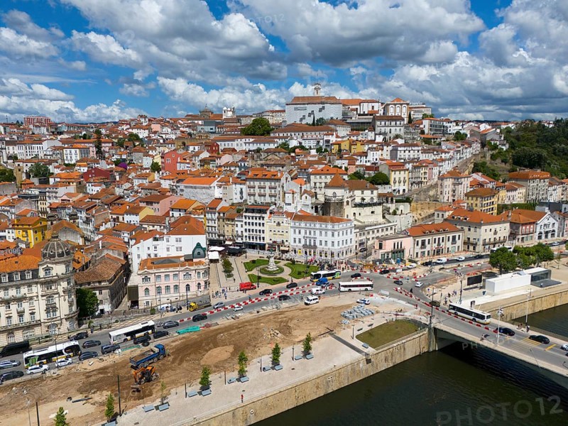 Urban landscape with many buildings and a bridge, under a cloudy sky, aerial view, Coimbra, Rio Mondego, Portugal, Europe