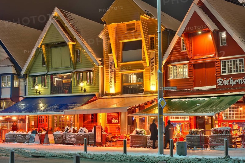 People sitting in front of a bar, winter, chrismas decoration, cold, gas powered heating stove keeps guests warm, Stavanger, Rogaland, Norway, Europe