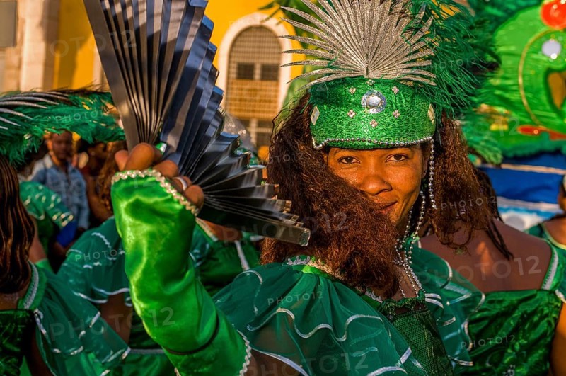 Happy, colourful costumed people. Carnival. Mindelo. Cabo Verde. Africa