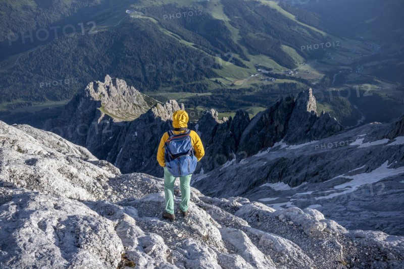Hiker Looking down into the valley from the Hochkönig, Salzburger Land, Austria, Europe