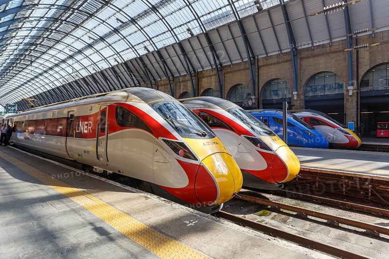 Azuma trains of London North Eastern Railway LNER and Lumo of FirstGroup at King's Cross station in London, Great Britain
