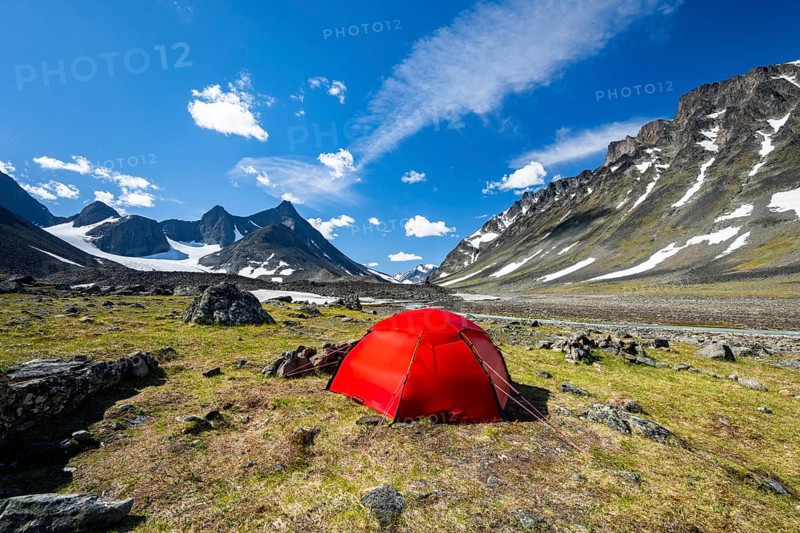 Red tent in Kaskasavagge valley, Kaskapakte glacier and mountains, mountain Kaskasatjakka and Kuopertjakka, river Gaskkasjohka, Kebnekaise massif, Lapland, Sweden, Europe