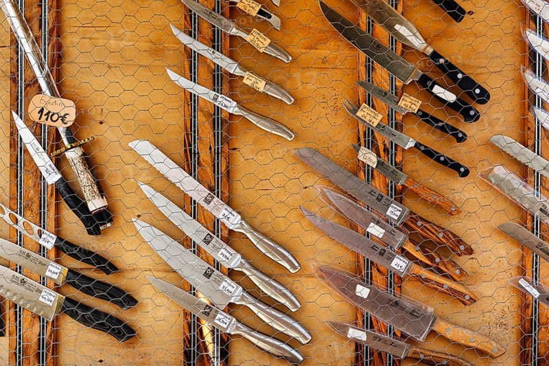 Traditional Portuguese knives in front of a souvenir shop, different shapes and materials, Ã“bidos, Portugal, Europe