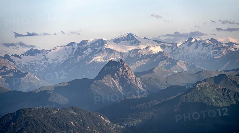 Evening atmosphere, view of GroÃŸvenediger and Venediger group in the Hohe Tauern, in front GroÃŸer Rettenstein, dramatic mountain landscape, view from Scheffauer, Tyrol, Austria, Europe