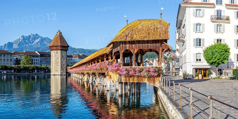 Lucerne city on the river Reuss with Chapel Bridge and Mount Pilatus panorama in Lucerne, Switzerland, Europe