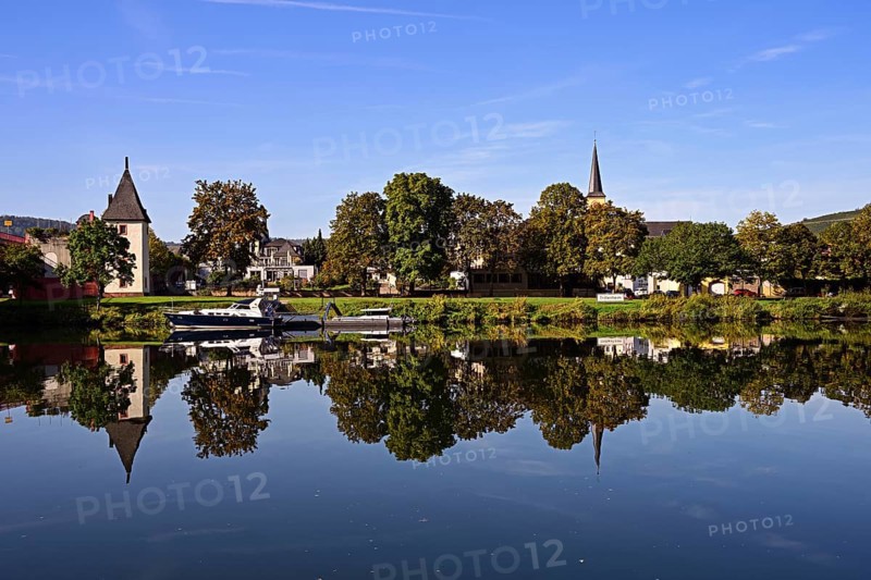 Houses in the village of Trittenheim are reflected in the Moselle, Trittenheim, Rhineland-Palatinate
