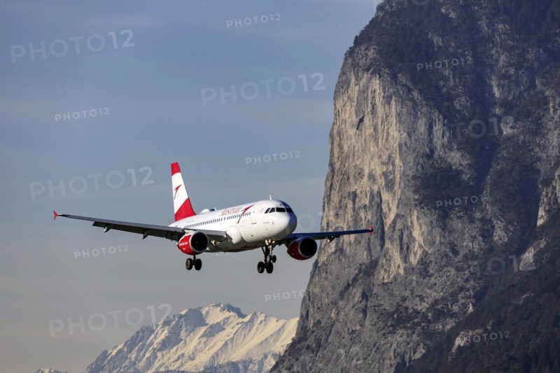 Aircraft of the airline Austrian Airlines, Airbus A319-100, approaching Innsbruck Kranebitten Airport, snow-covered mountains of the Alps, Innsbruck, Tyrol, Austria, Europe