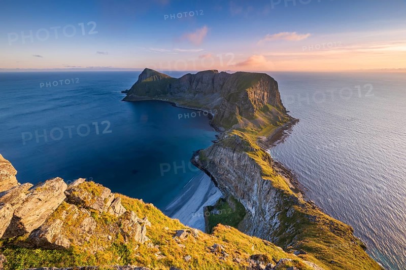View from Haheia or Haen mountain to mountains and coast, evening mood, Mastad peninsula, Vaeroy island, Vaeroy, Lofoten, Norway, Europe