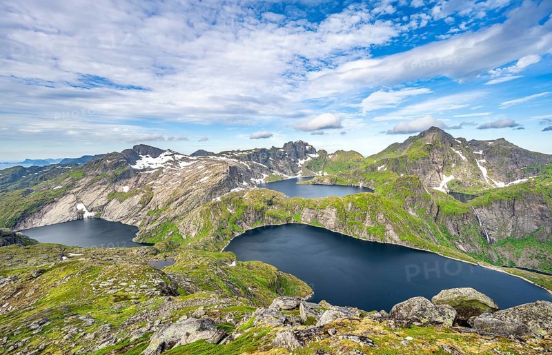Mountain landscape with steep rocky peaks and lake Tennesvatnet, Krokvatnet and Fjerddalsvatnet, in the back peak of Hermannsdalstinden, view from the top of Munken, Moskenesoya, Lofoten, Nordland, Norway, Europe