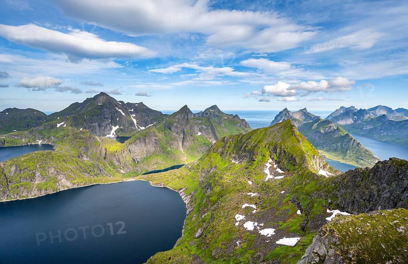 Mountain landscape with steep rocky peaks fjords and sea, view from the top of Munken to lakes Tennesvatnet and Krokvatnet and to Reinefjorden, Moskenesoya, Lofoten, Nordland, Norway, Europe