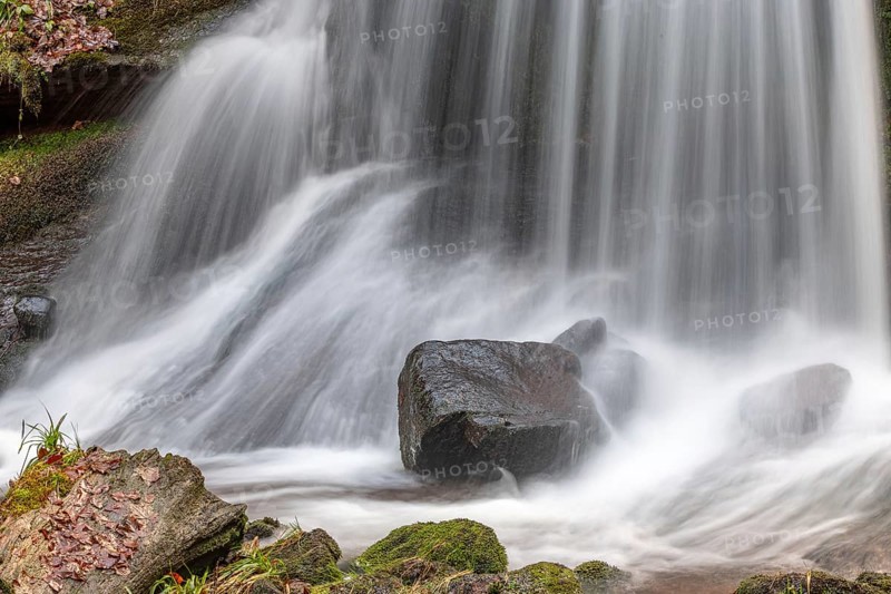 Beautiful fresh mountain waterfall in a wild and remote valley in winter. Vosges, Bas-Rhin, Collectivite europeenne d'Alsace, Grand Est, France, Europe