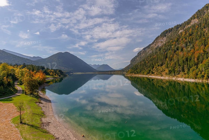 Intake structure at the Sylvenstein reservoir is used for flood protection, dams the Isar, power station, power generation, forest, water reflection, blue sky