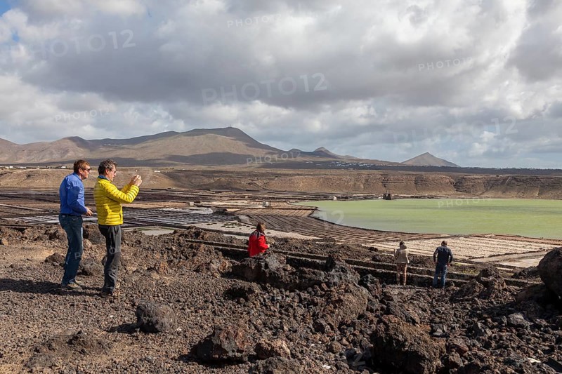 Tourists at the Janubio salt flats, Salinas de Janubio, sea salt production, Lanzarote, Canary Islands, Spain, Europe