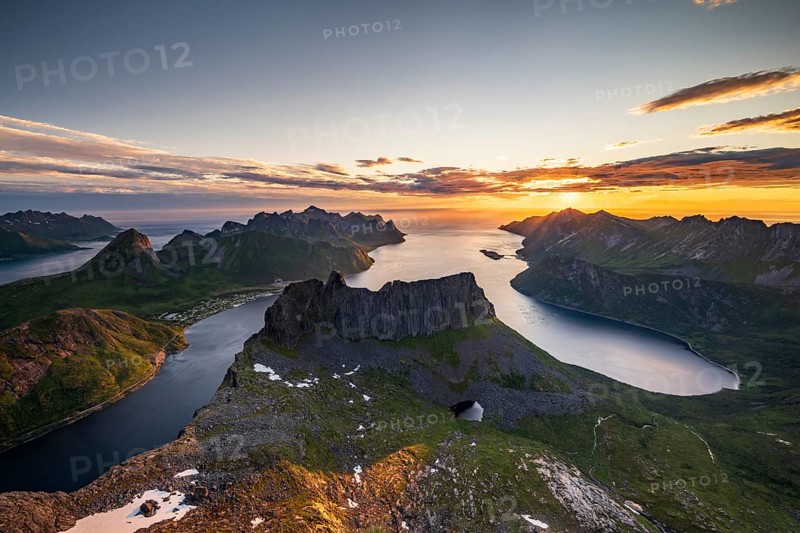 View over Senja's fjords and mountain peaks under the midnight sun, Mount Grytetippen, Senja, Norway, Europe