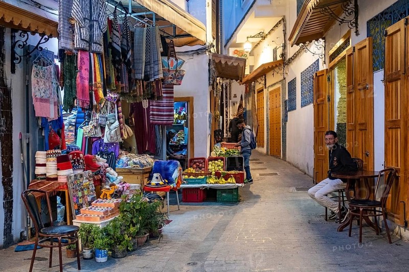 Shops at night in shopping street in medina of the city Tangier, Tanger, Morocco, Africa