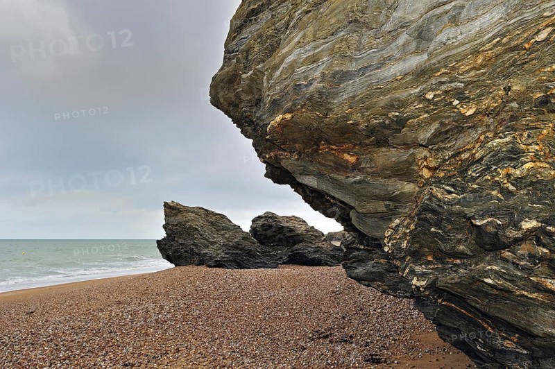 Pebble beach and eroded rocks at Saint-Hilaire-de-Riez, La Vendée, Pays de la Loire, France, Europe