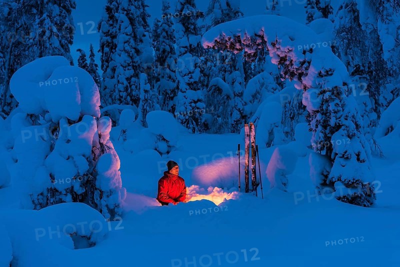 Man at the campfire, Muddus National Park, World Heritage Laponia, Norrbotten, Lapland, Sweden, Sweden, Scandinavia, Europe