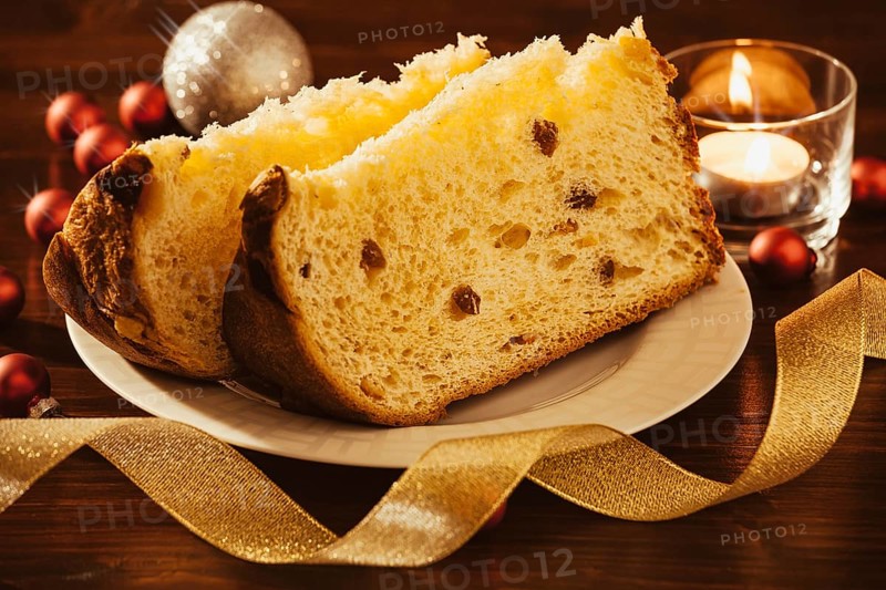 Closeup of sliced italian panettone with decorations
