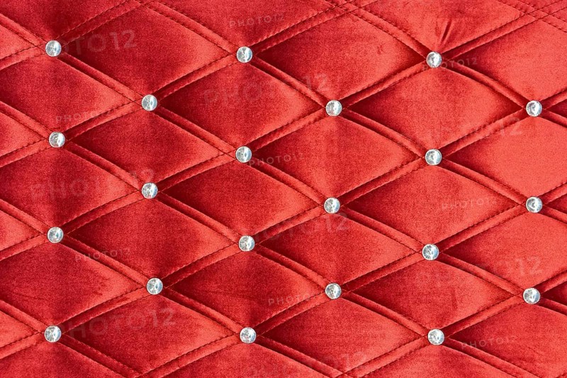 Red upholstery pattern with zircons decoration background