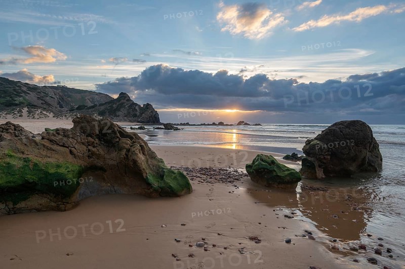 Praia do amado beach at sunset in Costa Vicentina, Portugal, Europe