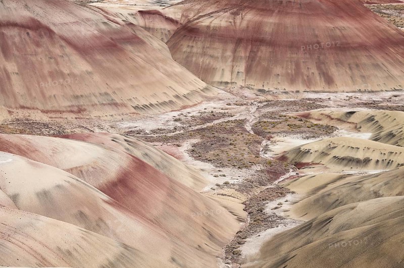 Volcanic ash colours the landscape of the Painted Hills in the John Day Fossil Beds National Monument