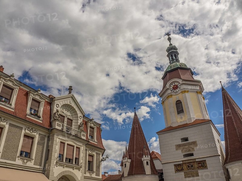 A town with historic buildings and a church tower under a partly cloudy sky, Dürnstein, Wachau, Danube, Austria, Europe