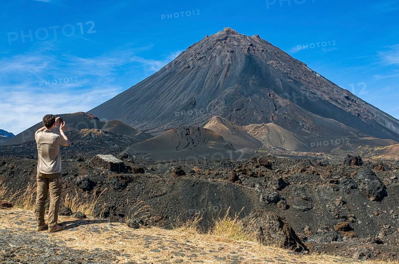 Man photographing vulcano on Fogo. Cabo Verde. Africa