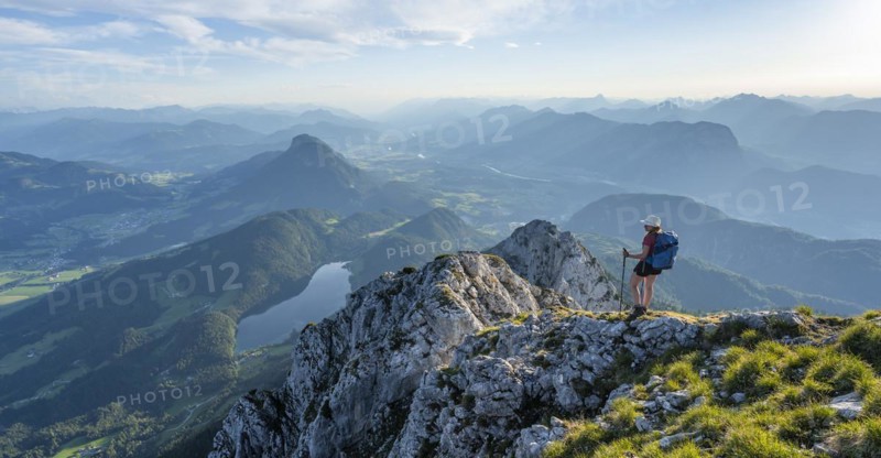 Hintersteiner Lake in the mountains, view from Schaffauer, hiker on a ridge in the mountains, Schaffauer, Wilder Kaiser, Tyrol, Austria, Europe