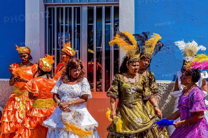 Colourful dressed women. Carnival. Mindelo. Cabo Verde. Africa