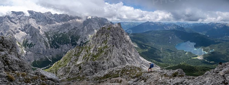 Alpine panorama, hiker, view of Eibsee lake and Werdenfelser Land, Wetterstein Mountains, Garmisch-Patenkirchen, Bavaria, Germany, Europe