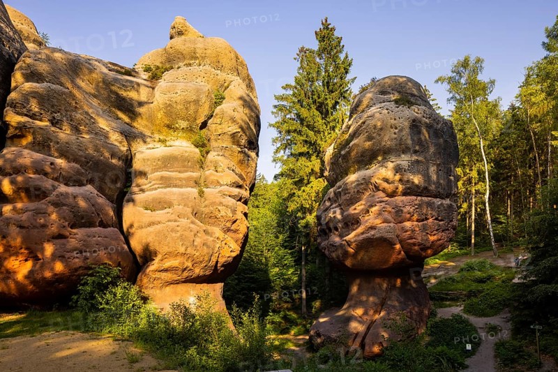 The Kelchstein is a mushroom rock in the Zittau Mountains near Oybin in Saxony and is part of the Kelchsteine natural monument. The Kelchstein is made of chalk sandstone, which is quite poor in binders. Its unusual mushroom shape is due to the effect of wind abrasion and erosion on the various hard sandstone layers