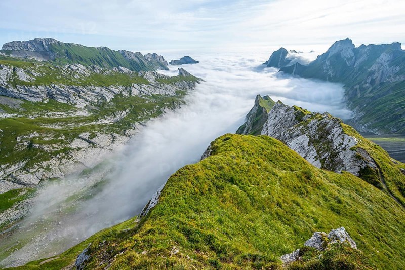 View of mountain peaks above the sea of clouds, Säntis mountains and valley of Meglisalp, high fog, Appenzell Ausserrhoden, Appenzell Alps, Switzerland, Europe