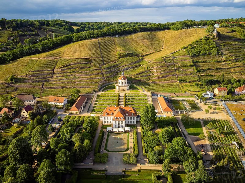 Wackerbarth Castle, originally Wackerbarths Ruh', is a Baroque castle surrounded by vineyards in the Radebeul district of Niederlössnitz on the road to Meissen, which serves as the seat of the Saxon State Winery. The winery belongs to the single vineyard Radebeuler Johannisberg within the large vineyard Lössnitz and is located in the listed historical vineyard landscape Radebeul