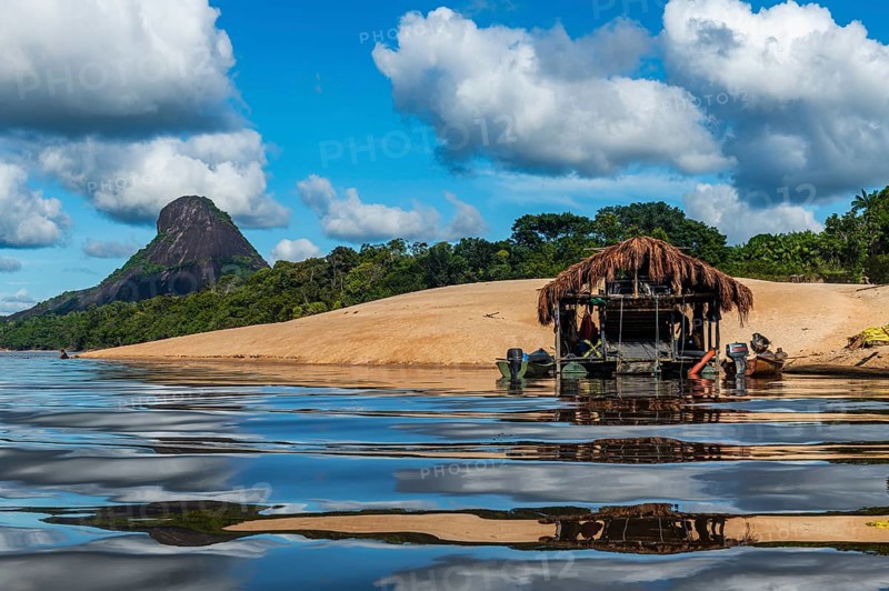 Illegal gold hut on the Mavecure river, before the granite hills, Cerros de Mavecure, Eastern Colombia