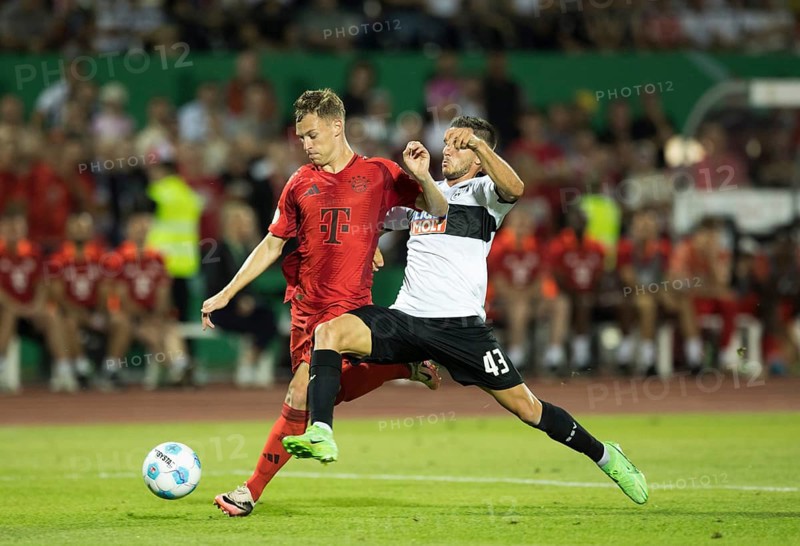 Football match, Joshua KIMMICH FC Bayern Munich left on the ball is tried to interfere with a creche by Romario RÖSCH SSV Ulm, football stadium Donaustadion, Ulm, Germany, Europe