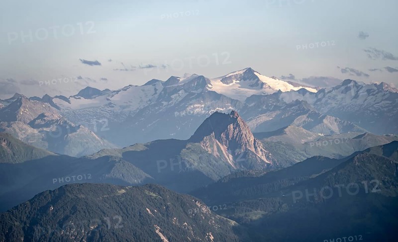 Evening atmosphere, view of Grossvenediger and Venediger group in the Hohe Tauern, in front Grosser Rettenstein, dramatic mountain landscape, view from Scheffauer, Tyrol, Austria, Europe