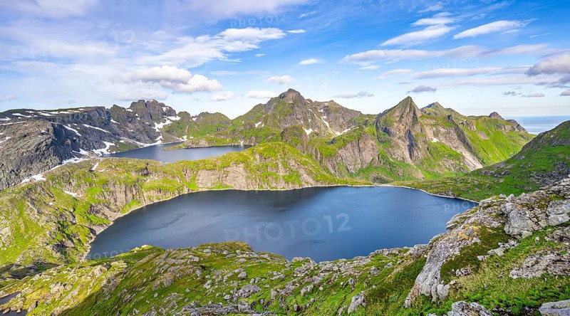 Mountain landscape with steep rocky peaks and lake Tennesvatnet and Krokvatnet, Hermannsdalstinden peak in the back, Moskenesoya, Lofoten, Nordland, Norway, Europe